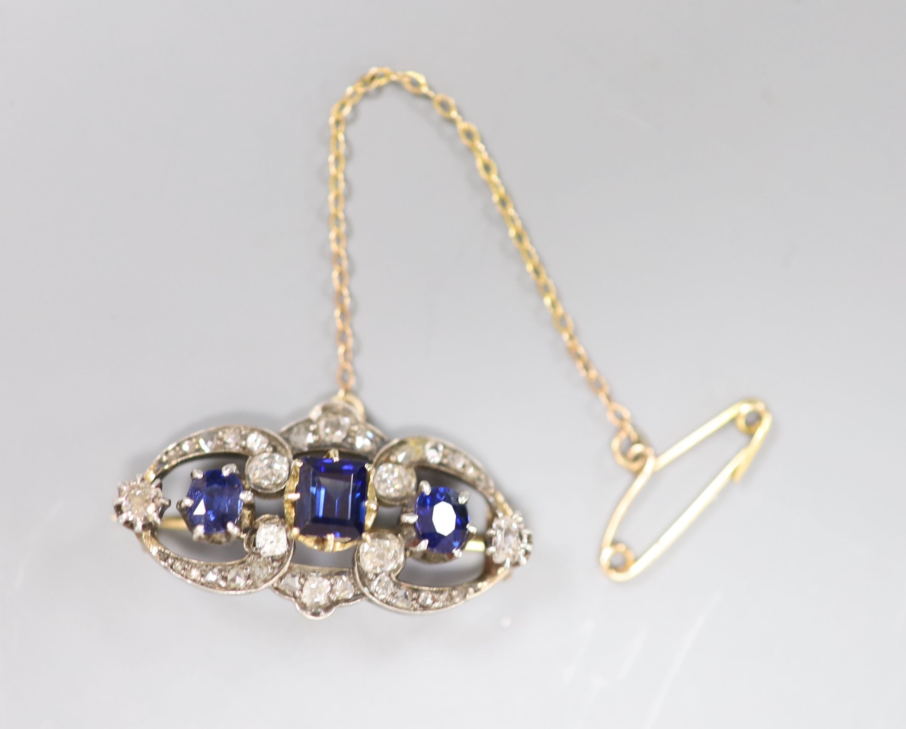 A Victorian sapphire and diamond openwork bar brooch, silver setting, 3.7g